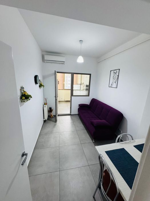 Închiriez Garsoniera tip Studio,  central, cu parcare