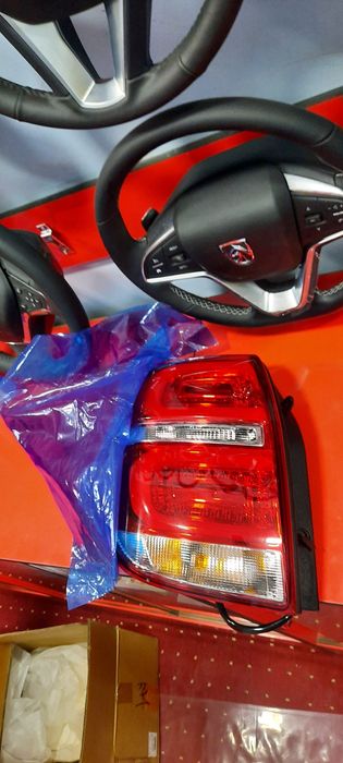 Captiva 4 orqa  fara yangi original