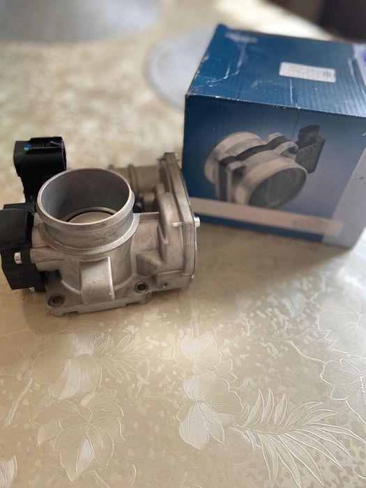 Продам дроссель на Lada Granta