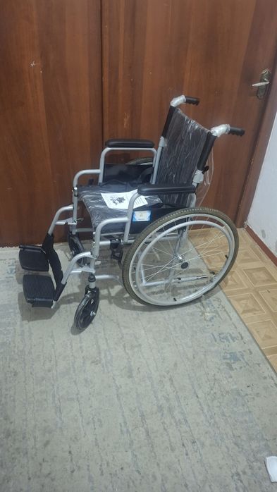 Инвалидная коляска
