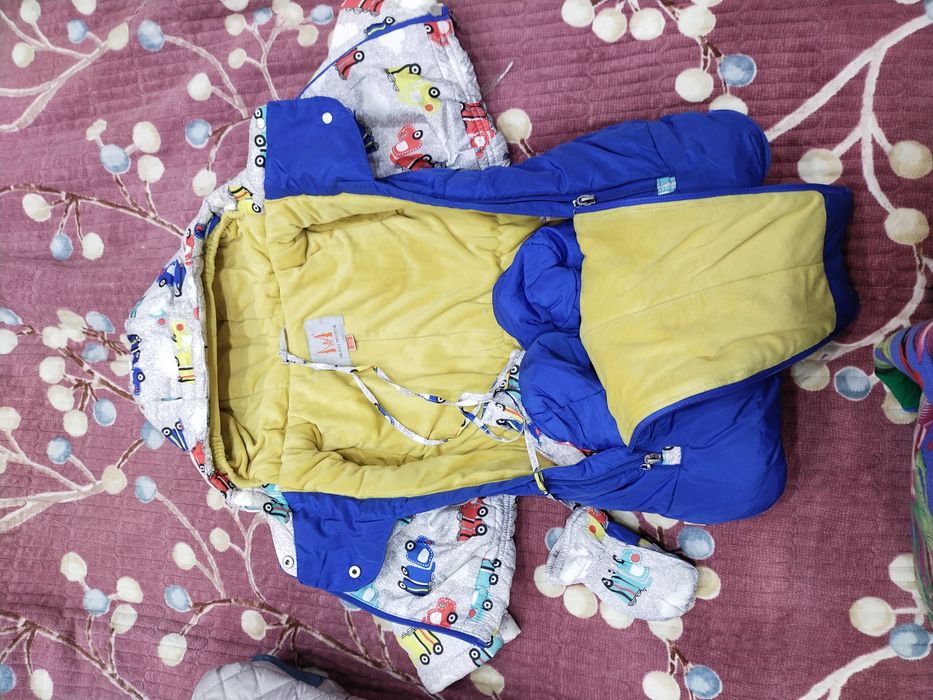 Продам зимние комбинезоны-конверты