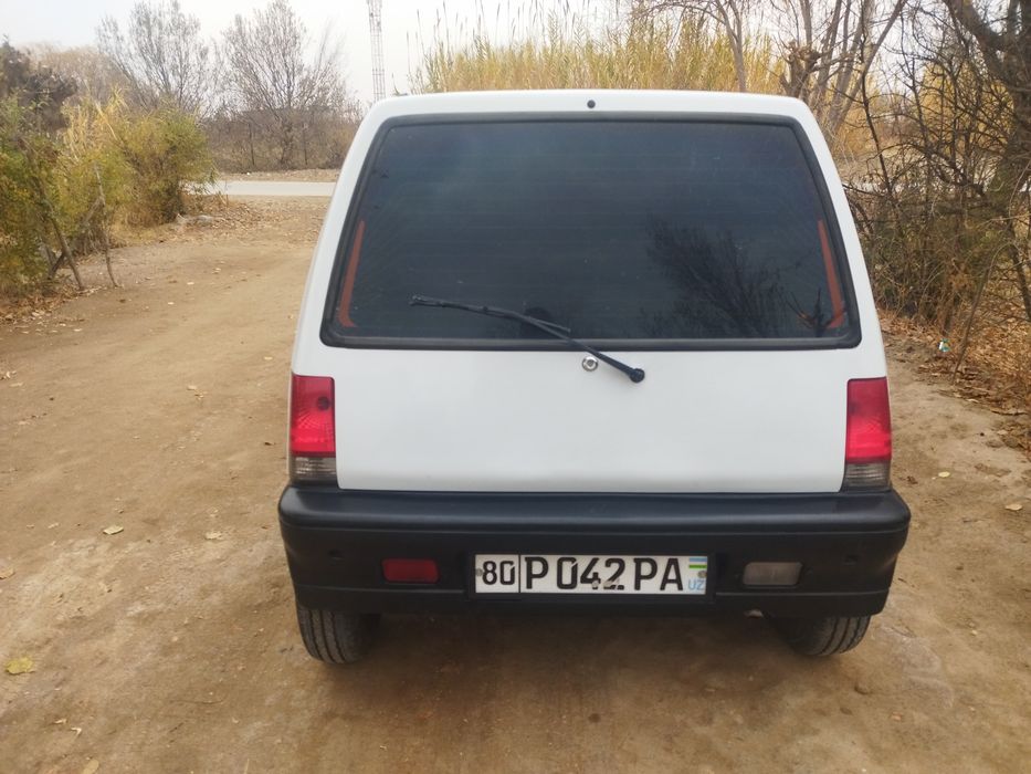 tico  1997 yil gazda