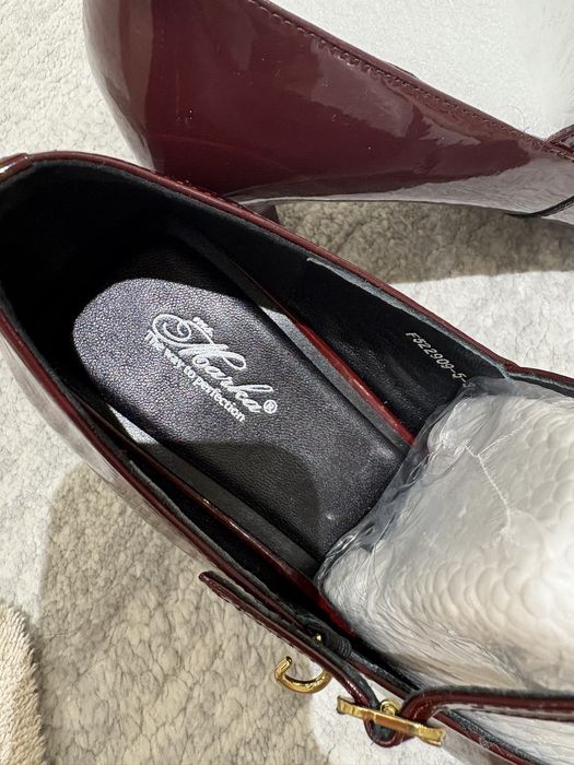 Новые кожаные туфли