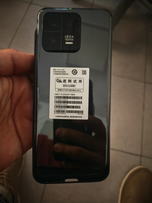 vand telefon Xiaomi 13