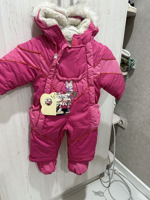 Продам детский зимний комбинезон новый