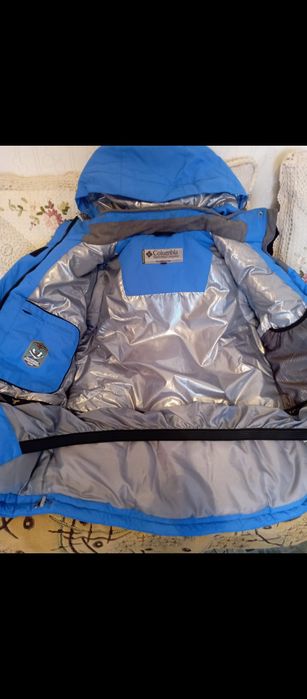 Продам пуховик женский