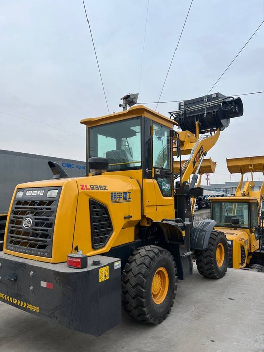 Фронтальная погрузчик миксерли