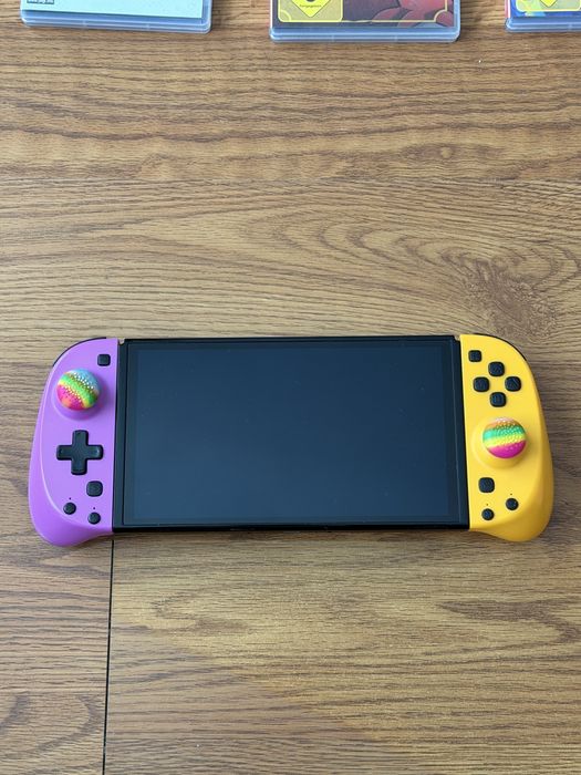 Nintendo Switch OLED + 9 jocuri + accesorii