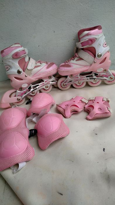 Роликовые коньки