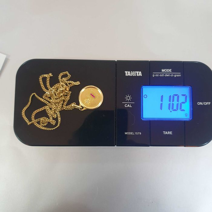 lant cu medalion ,rubin si diamant, aur 18k