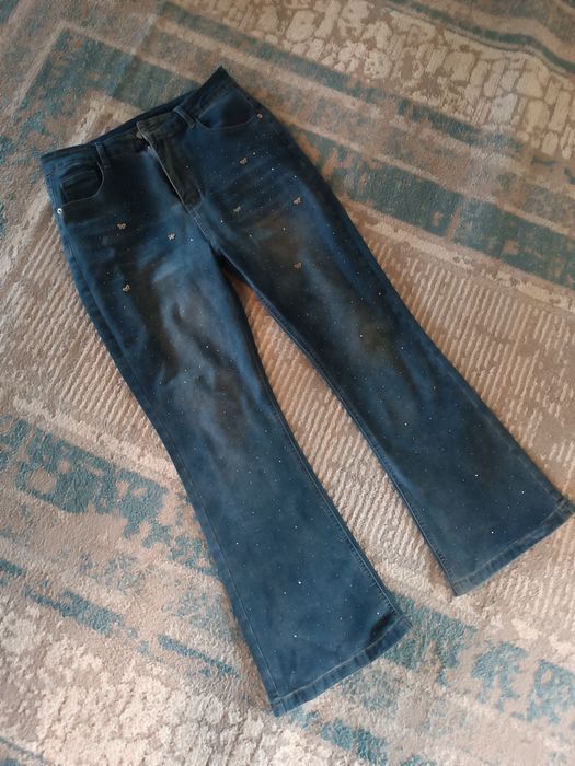 Джинсы клёш новые