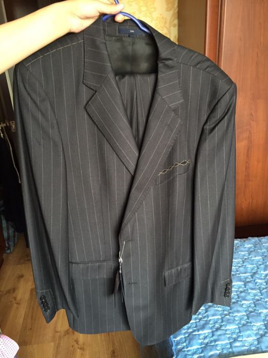 Продам новый костюм