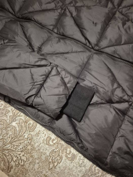 Новый пуховик 48 р