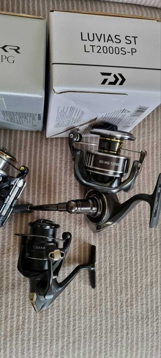 Mulinete spinning daiwa si shimano