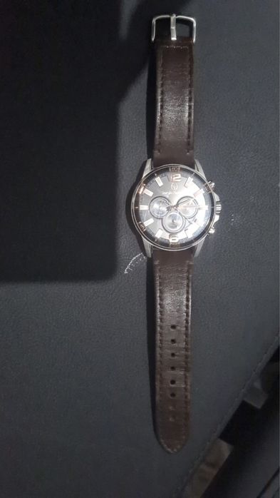 Часы кампония Sergio Tacchini