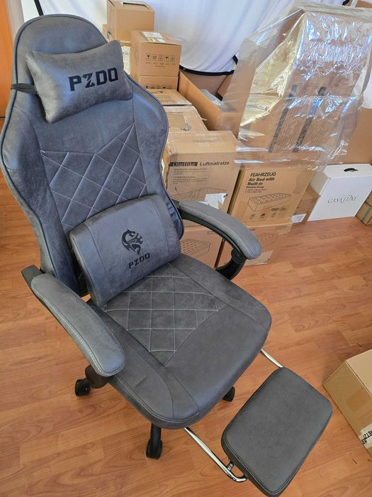 Scaun de birou ergonomic  cu material high-tech,suport pentru picioare