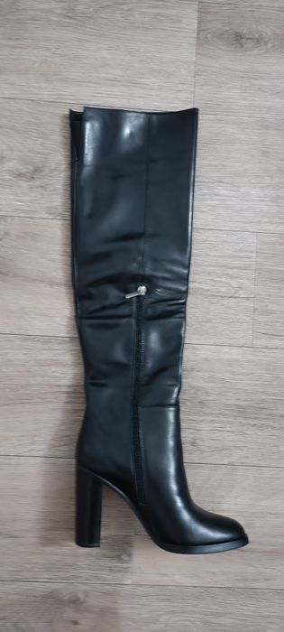 Продам сапоги новые