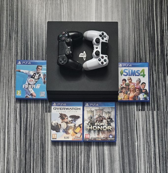 Consola Sony ps 4 pro 1 tb + 4 jocuri