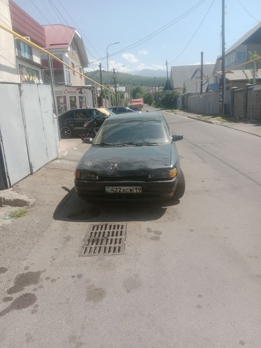 Автомобиль мазда323