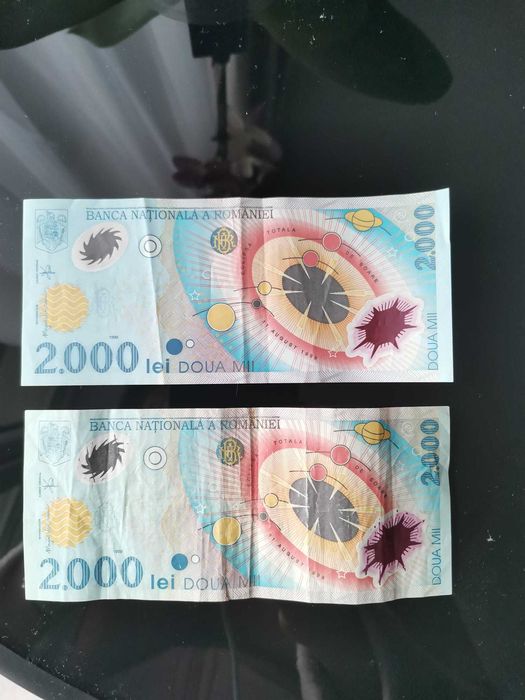 Bancnota 2000 Lei ( 3 bucati)  cu eclipsa din 1999