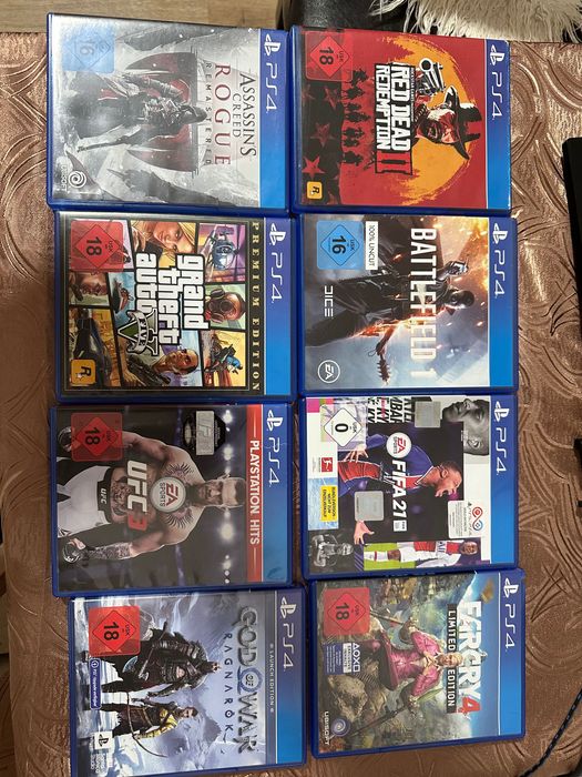 PlayStation 4 cu 2 controlere și jocuri