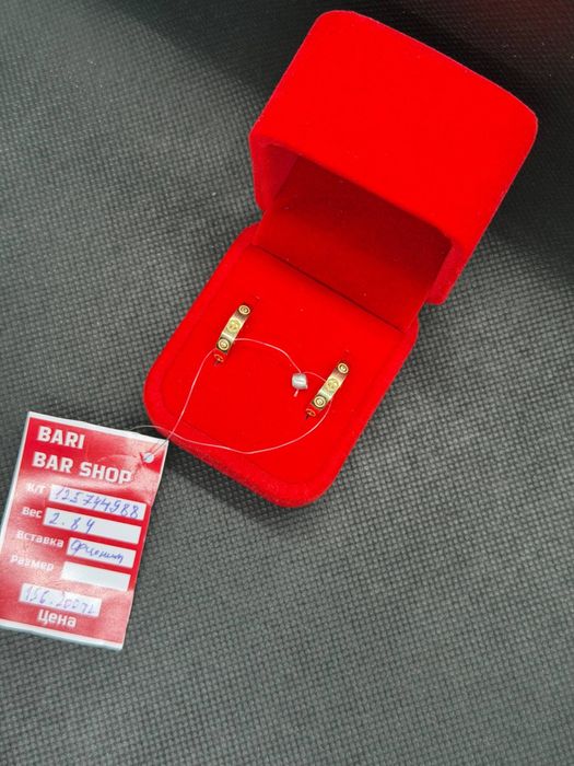 Золотые серьги cartie