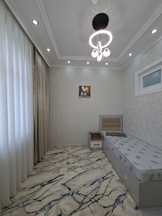 7-poliklinika ro'parasida yo'l ustida