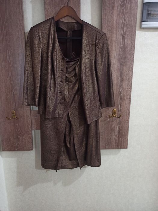 Продам б/у платья 46-52 размеры по