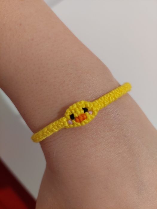 Bratara rățușcă, pui de găină