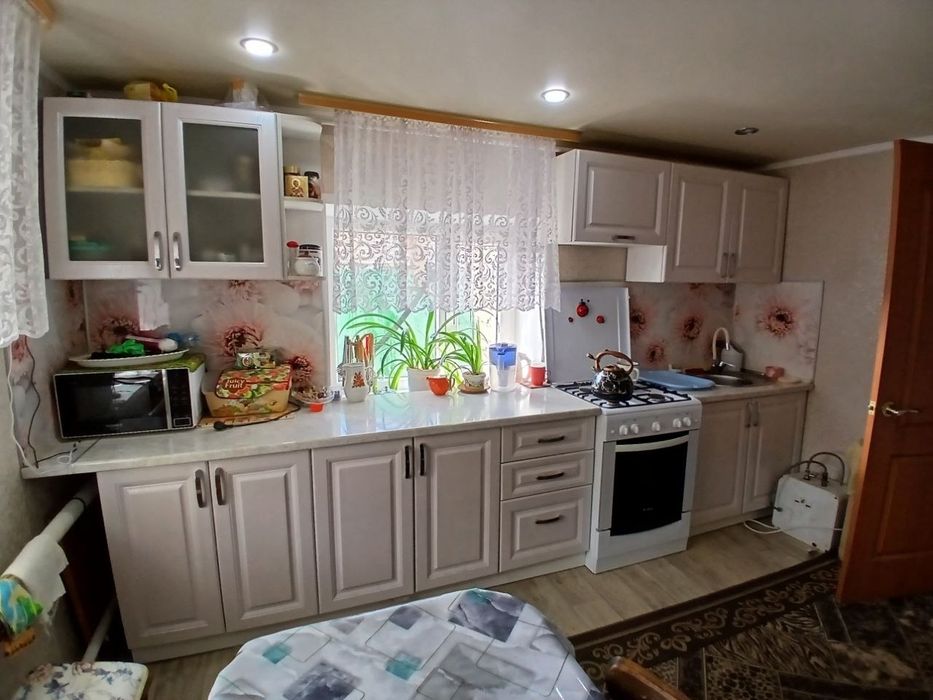 Продам дом саманный обложенный кирпичем