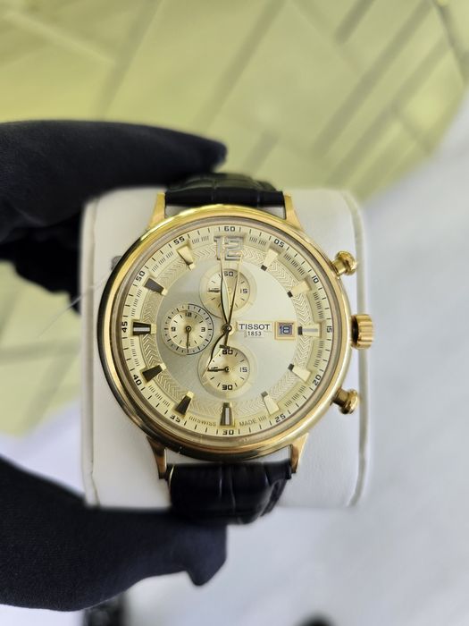 Продам золотые часы Tissot 750 пробы