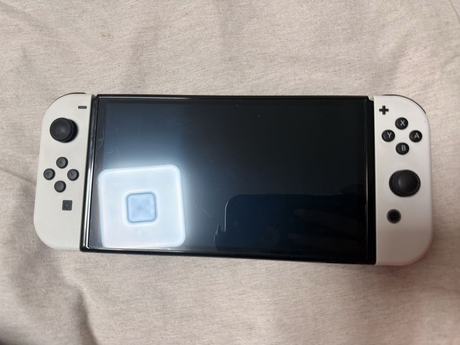 Nintendo Switch OLED с dock, аксесоари и игри