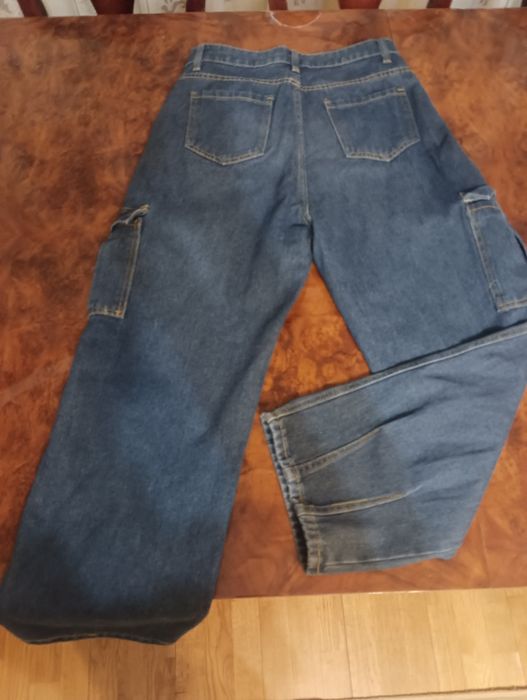 Новые синие джинсы