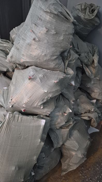 Бой плитки в мешках