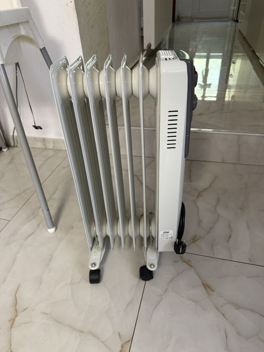 Titlu: Calorifer electric cu ulei Victronic OFR-7, 1500W, 7 elemenți