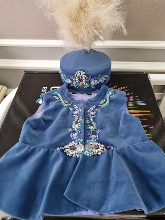 Кәжекей мен  тақия