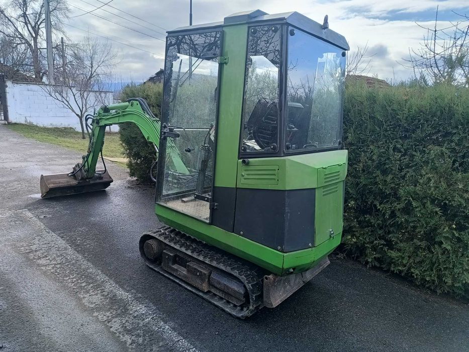 Минибагер ATLAS R 404