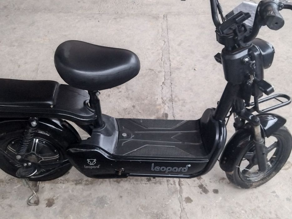 Леопард электраскутер
