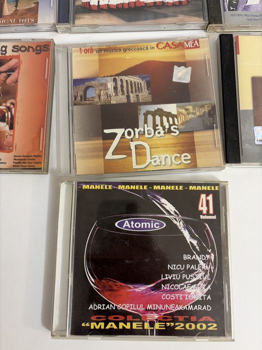 11 cd uri muzica si nu numai