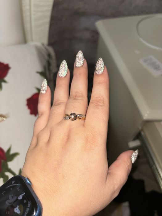 Золотые кольца с брильянтами.