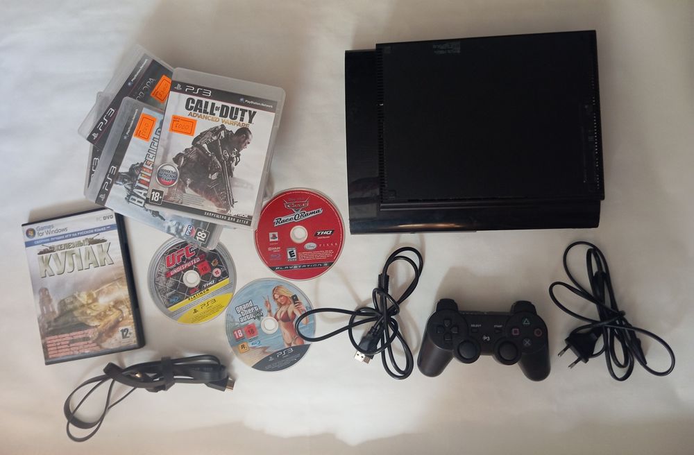 PS3 прошитая+11 дисков лицензионных