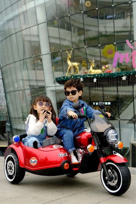 Детский мотоцикл для двух детей