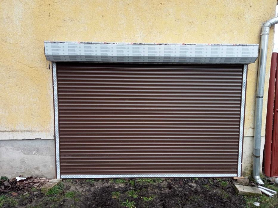 Usi garaj rulou=actionare electrica