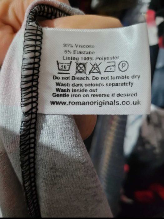 Rochie  nouă .Roman.UK