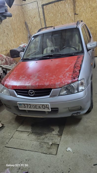 Мазда демио 2002год