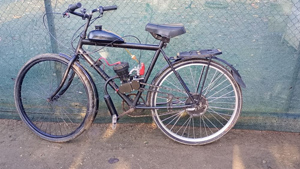 Vând bicicletă cu motor 100cc