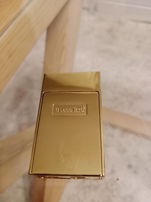 Бензиновая зажигалка.