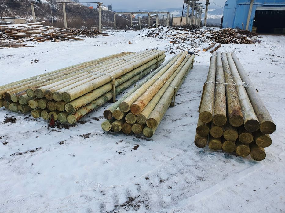Stalpi pentru linii aeriene de cablu din lemn calibrat si tratat