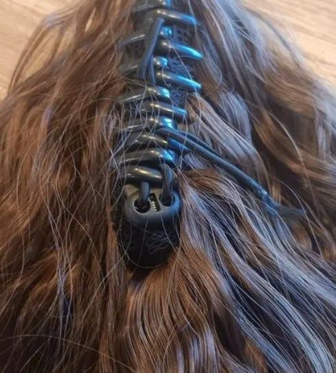 Дълга кафява опашка с шнола