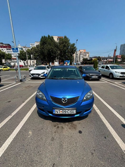 Vand mazda 3 1.4 benzina an 2006 masina merge fine traga bine nu are nimic propleme